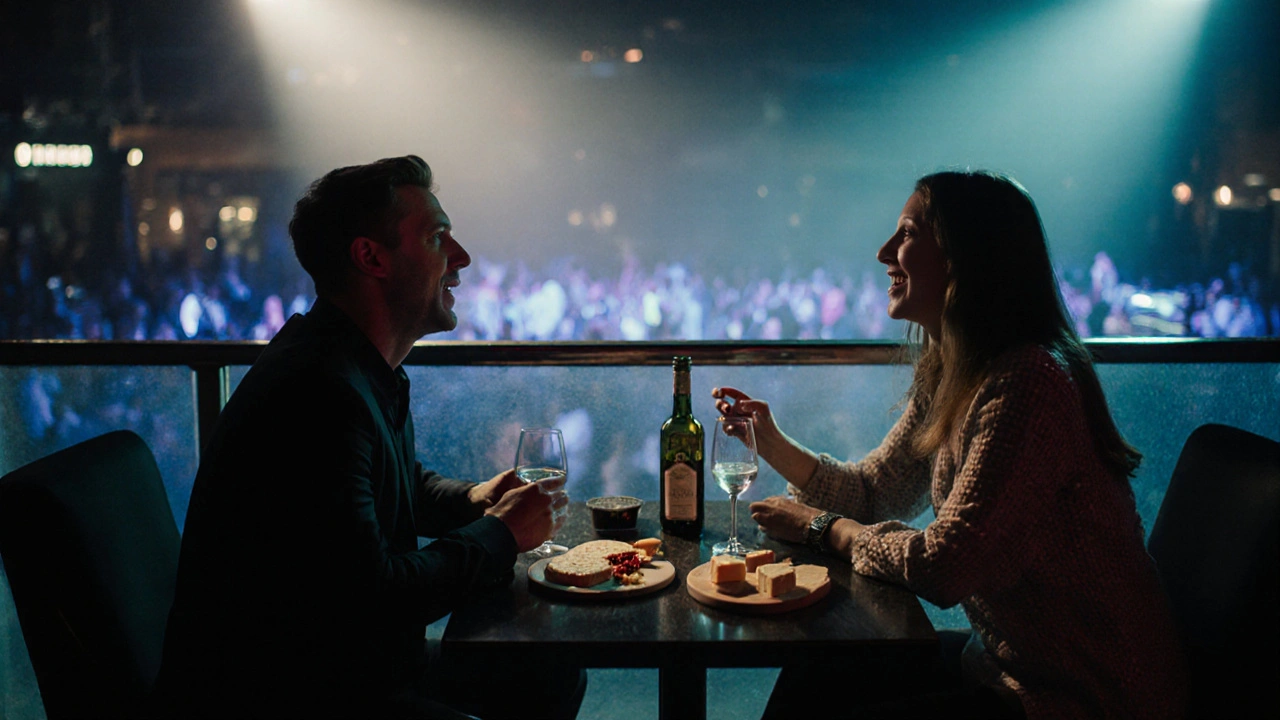 Couple enjoying a private table with drinks and cheese board in VIP area