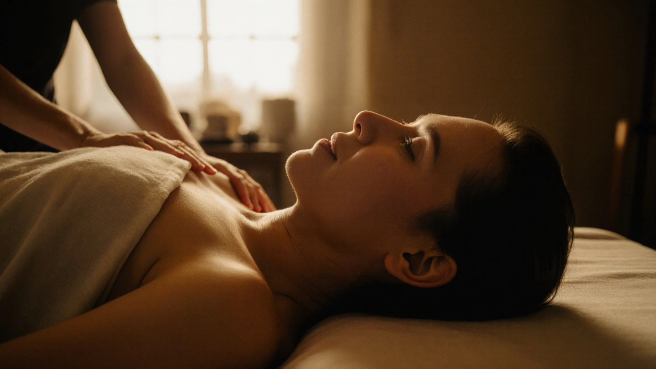 Person lying peacefully under a sheet during a massage, natural light streaming through a window.