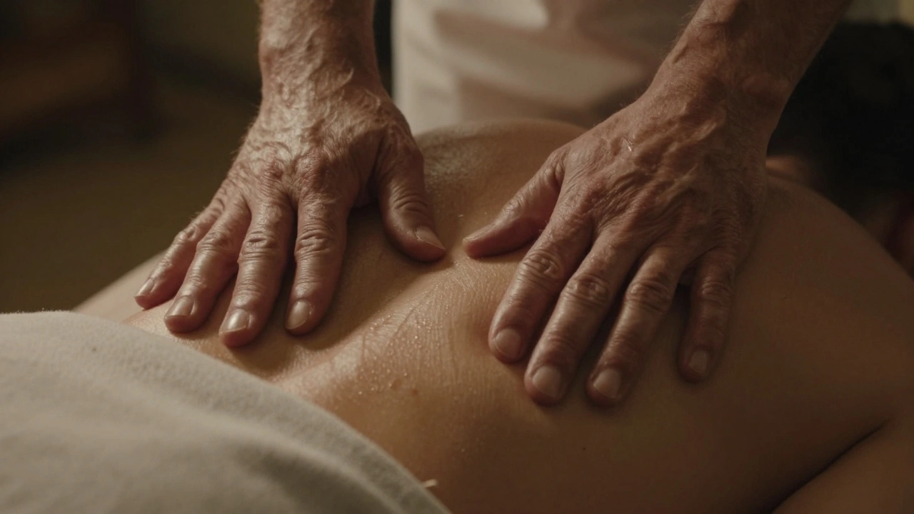 Hands applying pressure along spine during Thai massage session