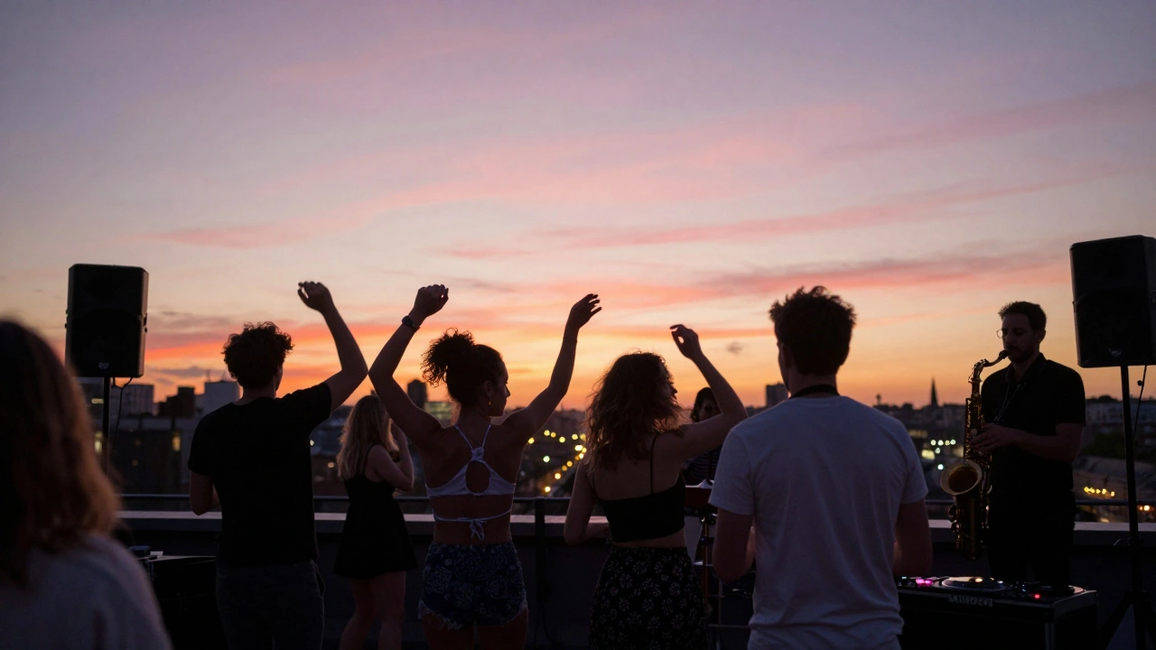 Rooftop party at sunrise with dancers silhouetted against a colorful sky.