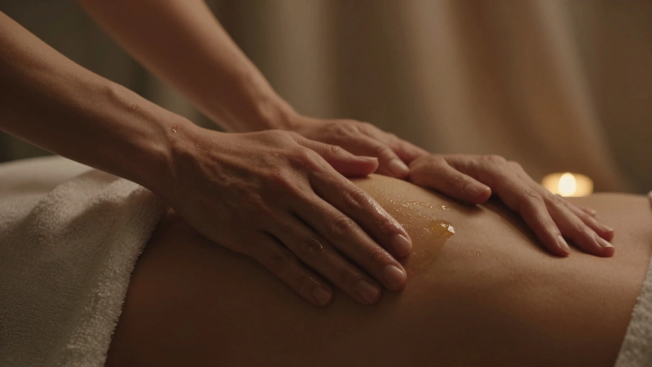 Close-up of hands applying warm oil to skin, no faces visible, emphasizing gentle touch and presence.